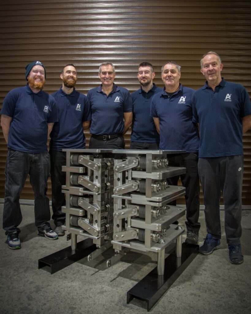 The Atwell International Team with the Colossus